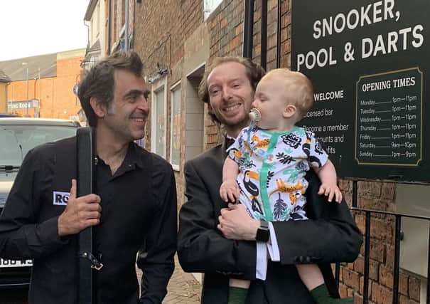 Ronnie O'Sullivan with owner Ben Jackson and his son Louie before the exhibition night at Jackson's in Melton EMN-210908-092036001