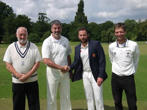 Captains Darren Bicknell and Gareth James at the toss with umpires Anthony Wade and Simon Cooper