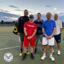 Members of the men's team.