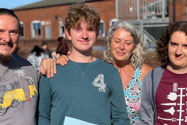 A student gets his GCSE results this morning at Long Field Academy EMN-211208-112428001
