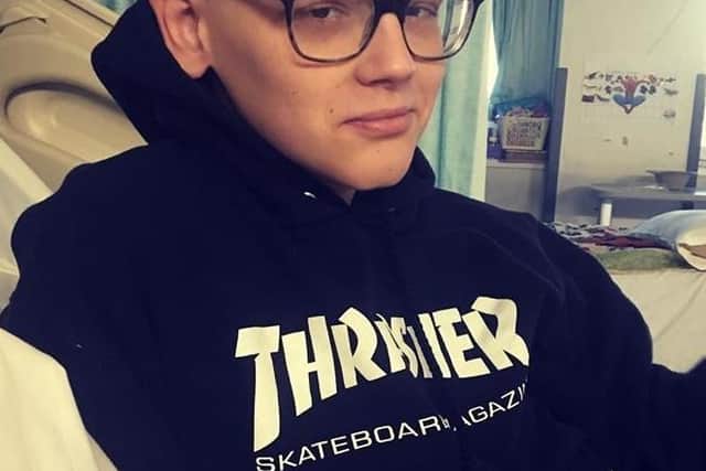 Charlie Hull, pictured in hospital during his cancer treatment, who has passed all if his GCSE subjects at Long Field Spencer Academy EMN-210816-120759001
