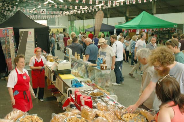 Crowds at Melton Cattle Market sample a tempting variety of pies, pastries and bread at the 2017 PieFest PHOTO: Tim Williams EMN-210817-115809001