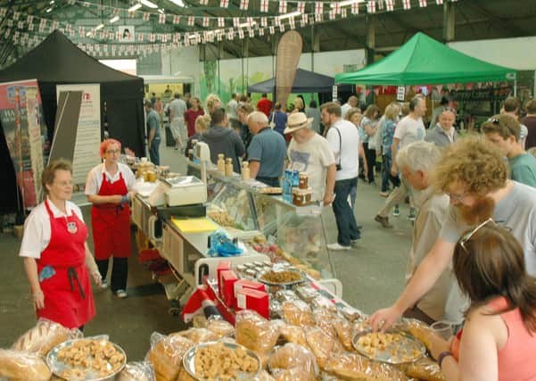 Crowds at Melton Cattle Market sample a tempting variety of pies, pastries and bread at the 2017 PieFest  PHOTO: Tim Williams EMN-210817-115809001