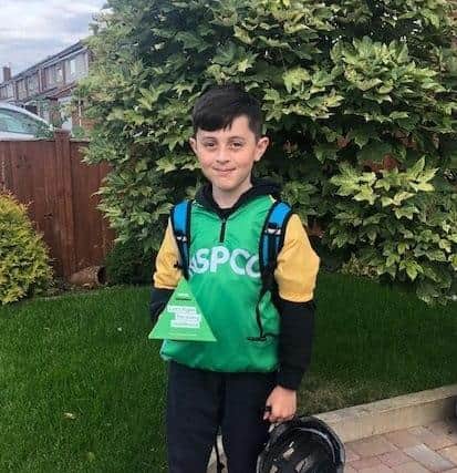 11-year-old Louie Hill who cycled around Rutland Water in aid of the NSPCC EMN-210817-174144001