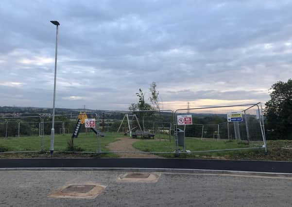 Unfinished work at Bellway's Steeple Chase housing development at Frisby on the Wreake, leaving the children's play area still fenced off EMN-210823-175939001