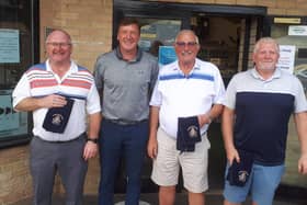 Grant Brown (second left) with the winning team, from left, Jeff Purdy, Roger Smith and Ian McParland. Not pictured: Eddie Malloy.