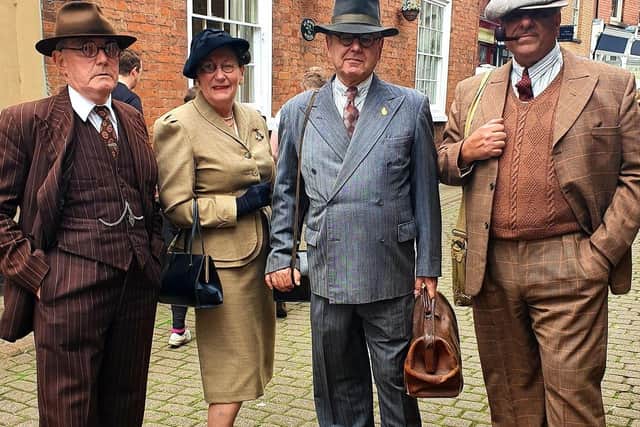 People dressed in period clothing in Church Street at the 40s Melton weekend
Photo Caroline Jane Gibson EMN-210830-165313001