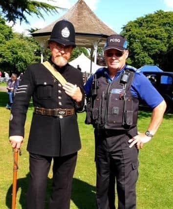 Then and now - a modern day police officer poses with one from the 1940s at the 40s Melton weekend EMN-210830-165434001
