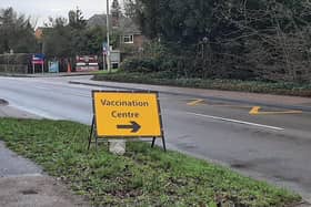 A sign indicating the turning for a Leicestershire Covid vaccination centre EMN-211009-151927001