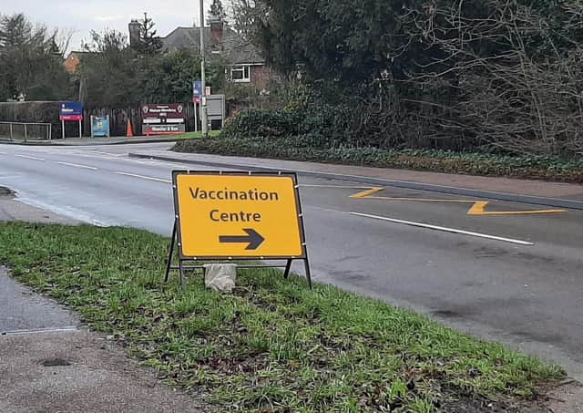 A sign indicating the turning for a Leicestershire Covid vaccination centre EMN-211009-151927001