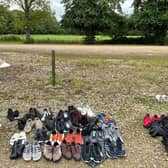 Helen Cliff with donated footwear for the refugees at Scalford hotel EMN-210914-171924001