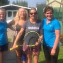 The winning team from Belvoir Vale Tennis Club enjoy their win.