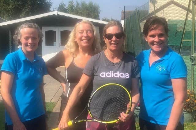 The winning team from Belvoir Vale Tennis Club enjoy their win.