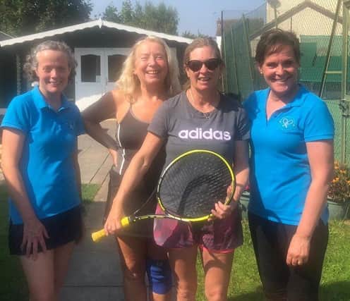 The winning team from Belvoir Vale Tennis Club enjoy their win.