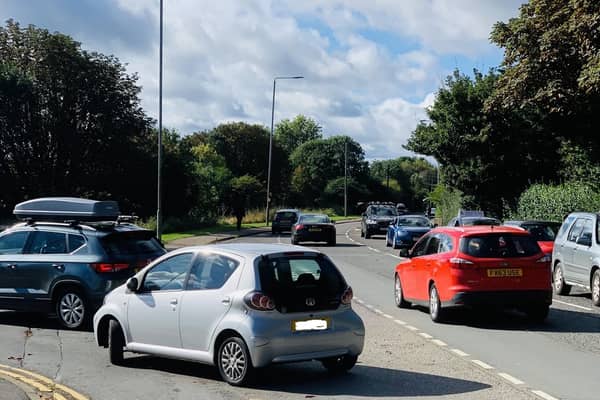 Long queues form at the Thorpe Road access to the Tesco petrol station this morning in Melton
PHOTO ANTHONY MEE EMN-210927-161524001