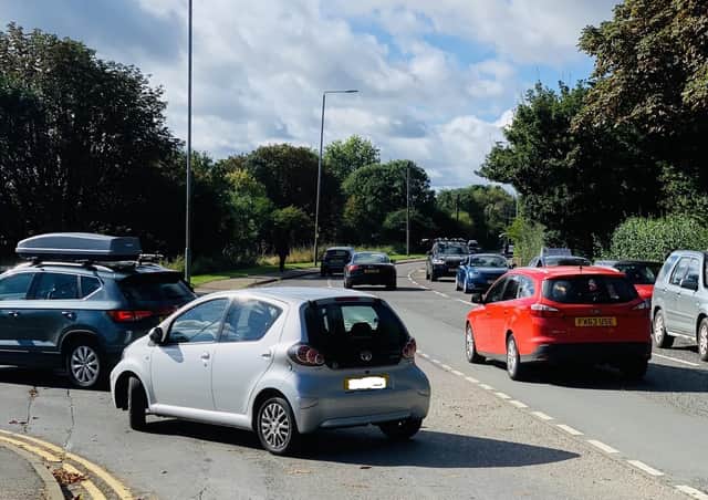 Long queues form at the Thorpe Road access to the Tesco petrol station this morning in Melton
PHOTO ANTHONY MEE EMN-210927-161524001