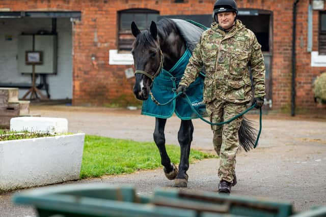 Corporal of The Horse Andrew Mancey exercising Animals as part of the Christmas duties within the Defence Animal Training Regiment in Melton Mowbray last year
Photographer:
Cpl Paul Watson / MoD Crown EMN-210927-124814001
