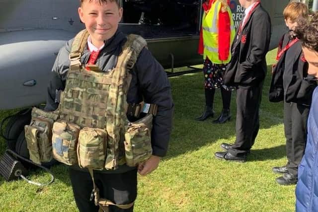 Students enjoy a visit to Melton's John Ferneley College by former pupil, Flt Lt Clark, and his crew colleagues from Puma Force, RAF Benson EMN-210930-132156001