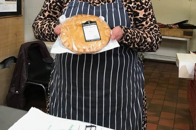 Sarah Meeham on the Bowring Butchers stand at the East Midlands Food Festival at Melton Livestock Market on Sunday EMN-210410-155140001