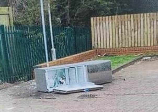 A fridge freezer dumped in a care park on Drummond Walk, Melton, which led to the offender being prosecuted in court
PHOTO MELTON BOROUGH COUNCIL EMN-210510-111503001