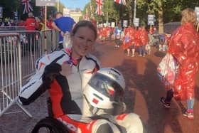 Claire Lomas poses with her medal at the end of Sunday's London Marathon EMN-210510-180405001