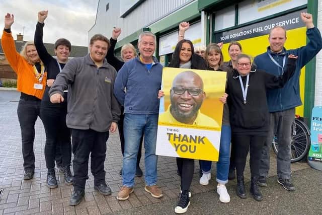 Manager Kerry Martin and some of her staff members pictured last year celebrating funding 1,000 lifesaving air ambulance missions through The Hanger superstore in Melton Mowbray