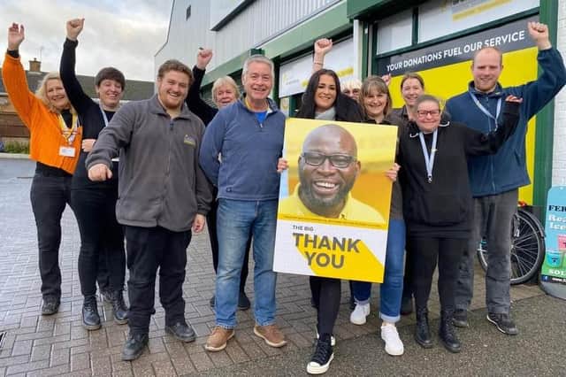 Manager Kerry Martin and some of her staff members pictured last year celebrating funding 1,000 lifesaving air ambulance missions through The Hanger superstore in Melton Mowbray