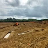 Archaeologists examine remains of Roman planting beds in the farmstead unearthed during work to build Melton's NEMMDR