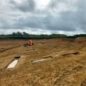 Archaeologists examine remains of Roman planting beds in the farmstead unearthed during work to build Melton's NEMMDR