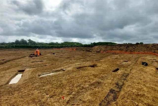 Archaeologists examine remains of Roman planting beds in the farmstead unearthed during work to build Melton's NEMMDR