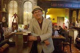 Gary Cross enjoying a pint of real ale