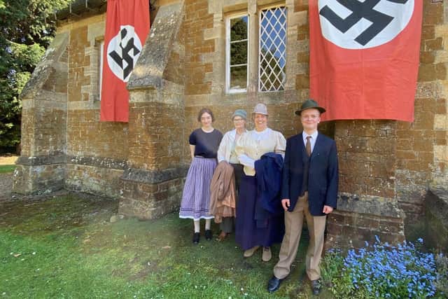 Some of the extras for the Loyal Enemy short film pictured outside the Goadby Marwood village hall set