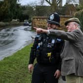 PCC Rupert Matthews discussing crime prevention in a Leicestershire village