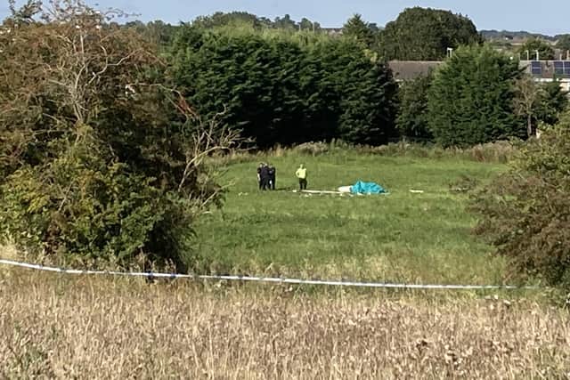 The wreckage in the field off the A607 Leicester Road in Melton following yesterday's mid-air glider collision
