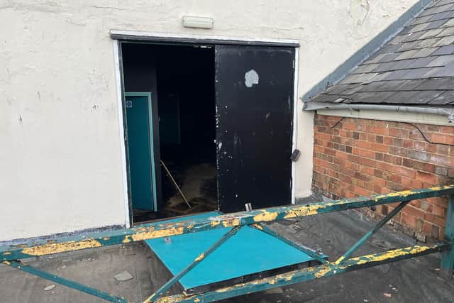 Evidence of a break-in at the rear of the vacant building formerly occupied by The Mall