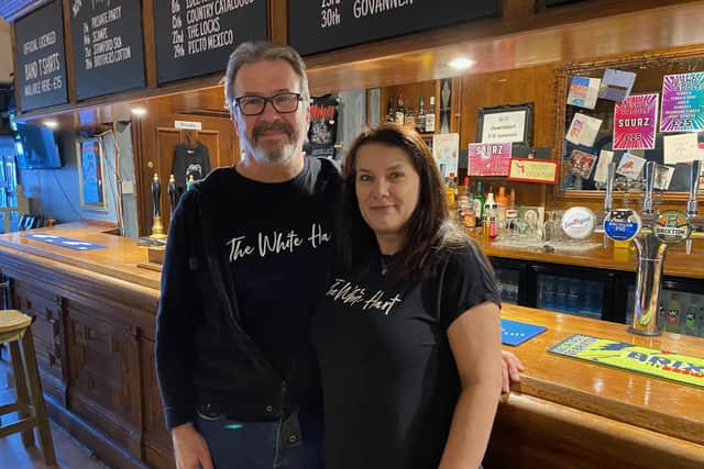 Landlords Richard and Hazel Hewson pictured in The White Hart pub in Melton Mowbray