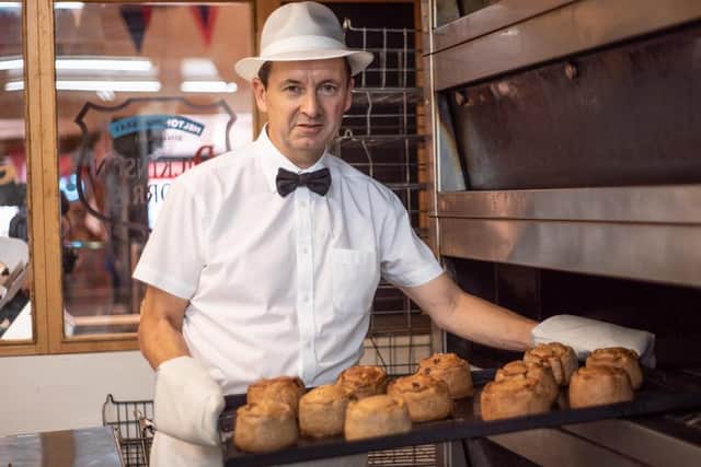 Stephen Hallam, an ambassador for the Dickinson and Morris Ye Olde Pork Pie Shoppe in Melton, pictured with a tray of Melton Mowbray pork pies