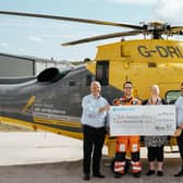 The Grace Trust present a cheque for £15,000 to the local air ambulance