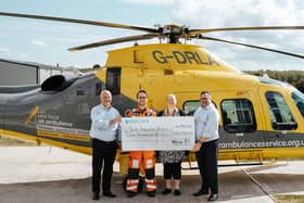 The Grace Trust present a cheque for £15,000 to the local air ambulance