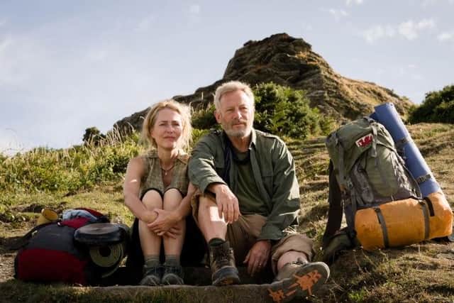 Gillian Anderson and Jason Isaacs in a scene from movie, The Salt Path