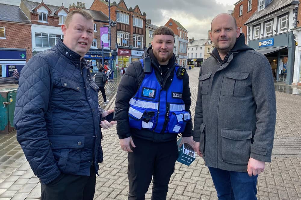 From left, town trader Barrie Roberts, security operative Nick and Melton BID manager James Colclough in Melton Mowbray town centre