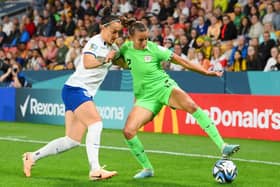 BRISBANE, AUSTRALIA - AUGUST 07: Ashleigh Plumptre of Nigeria and Lucy Bronze of England compete for the ball during the FIFA Women's World Cup Australia & New Zealand 2023 Round of 16 match between England and Nigeria at Brisbane Stadium on August 07, 2023 in Brisbane / Meaanjin, Australia. (Photo by Bradley Kanaris/Getty Images)