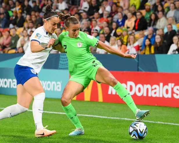 BRISBANE, AUSTRALIA - AUGUST 07: Ashleigh Plumptre of Nigeria and Lucy Bronze of England compete for the ball during the FIFA Women's World Cup Australia & New Zealand 2023 Round of 16 match between England and Nigeria at Brisbane Stadium on August 07, 2023 in Brisbane / Meaanjin, Australia. (Photo by Bradley Kanaris/Getty Images)