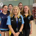 Melton Swimming Club coach Tracy McGhie with some of the club's talented young swimmers