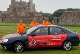 Member of the Melton Round Table with the W-Reg Mondeo they have entered in the SkinFlint Rally