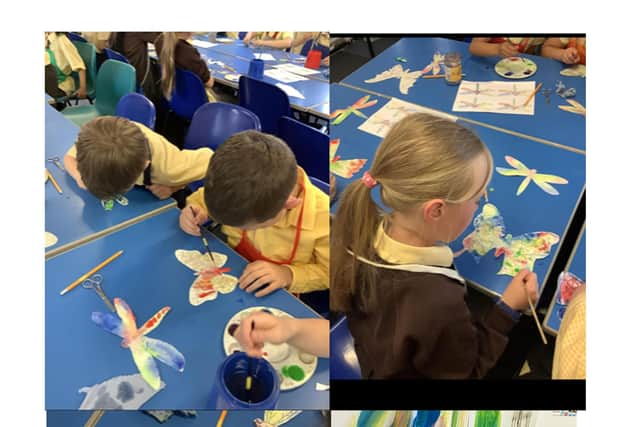 Pupils work on the new mural at St Francis Primary School in Melton