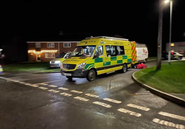 An ambulance crew waits in the Blakeney Crescent area on Monday evening during the 12-hour police stand-off
Photo George Icke