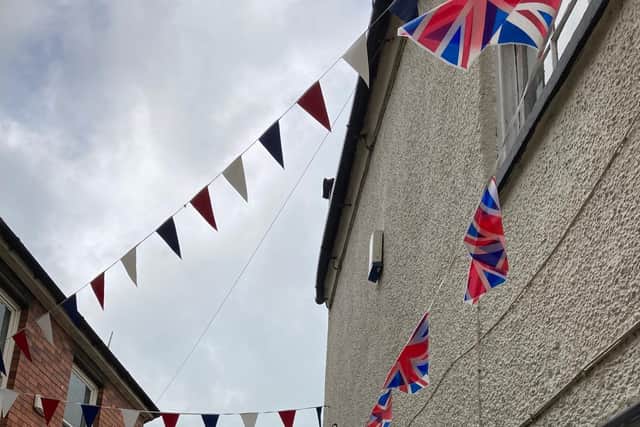 The bunting up in Church Lane, Melton