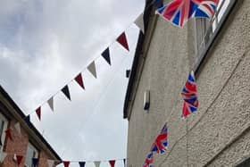 The bunting up in Church Lane, Melton