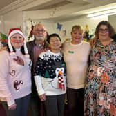 Attendees and volunteers enjoy their Christmas party at the Melton's Pepper's - A Safe Place centre with Jenny Hendry (second from right)